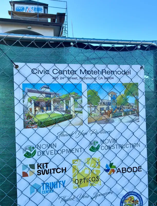 Exterior view of the former Motel 6 in Richmond under construction for a homeless housing conversion project