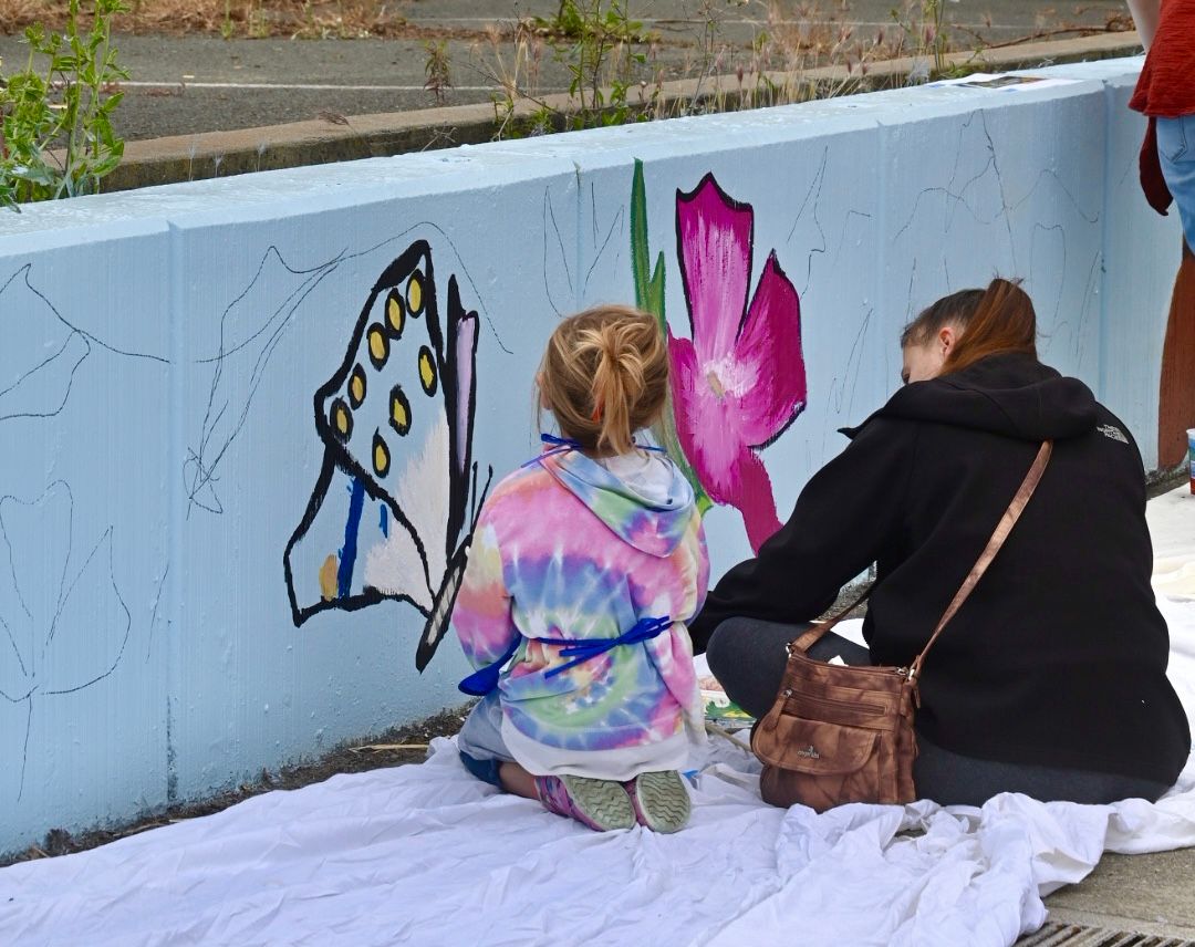 Community mural painting unites neighborhoods