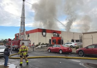 Richmond firefighters battle blaze at Public Storage facility on Carlson Boulevard