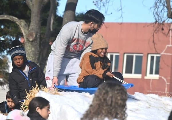 The unusual sight of snow in Richmond delights crowd