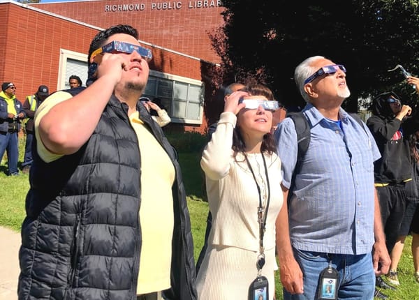 Richmond pauses to view eclipse