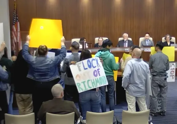 Supporters and opponents of Flock automated license plate reader cameras 